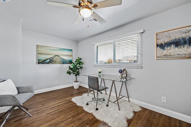 office space featuring dark wood-type flooring and ceiling fan