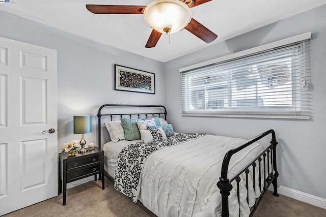 bedroom featuring ceiling fan and carpet floors