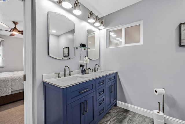 bathroom with vanity and ceiling fan