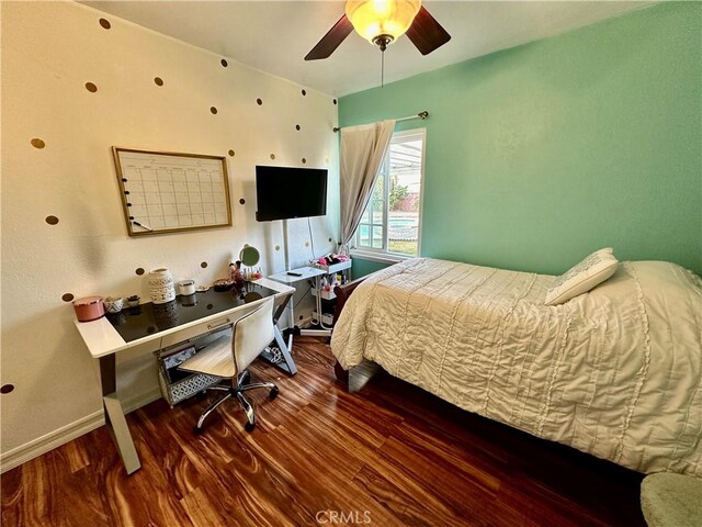 bedroom featuring hardwood / wood-style flooring and ceiling fan