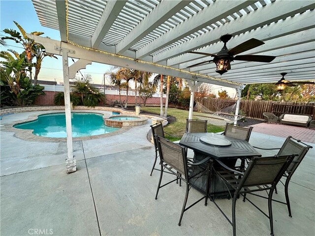 view of swimming pool featuring a pergola, a patio area, ceiling fan, and an in ground hot tub