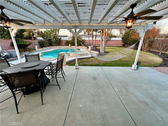 view of patio featuring a fenced in pool, ceiling fan, and a pergola