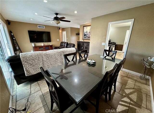 dining room with ceiling fan