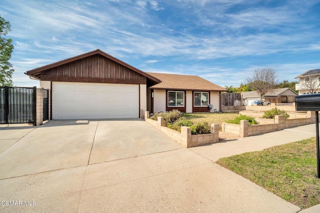 single story home featuring a garage and a front yard