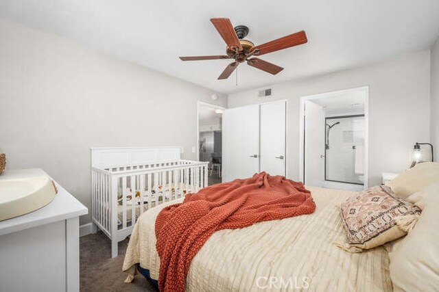 bedroom featuring sink and ceiling fan