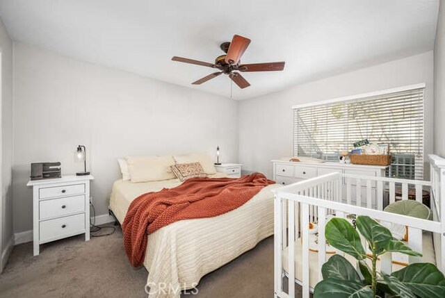 bedroom featuring carpet floors and ceiling fan