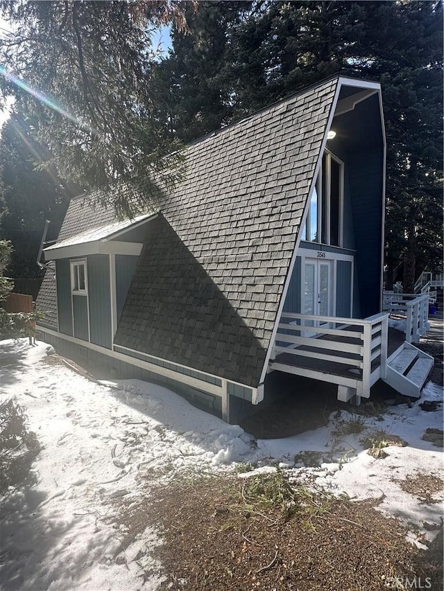 view of snow covered property