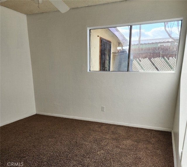 116 Beardsley Ave, Bakersfield, CA 93308 - carpeted empty room featuring baseboards and a ceiling fan