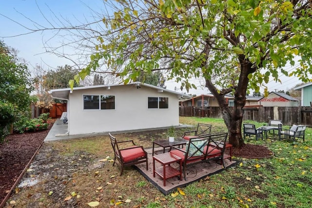 back of house with a patio