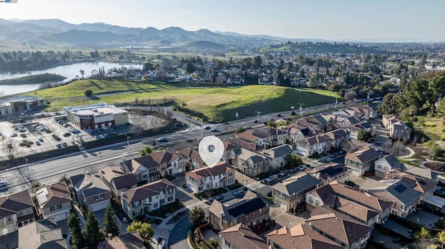 aerial view with a water and mountain view