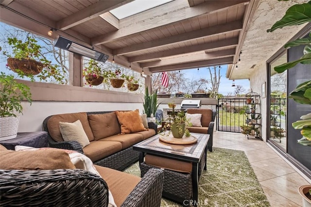 view of patio / terrace with area for grilling and an outdoor living space