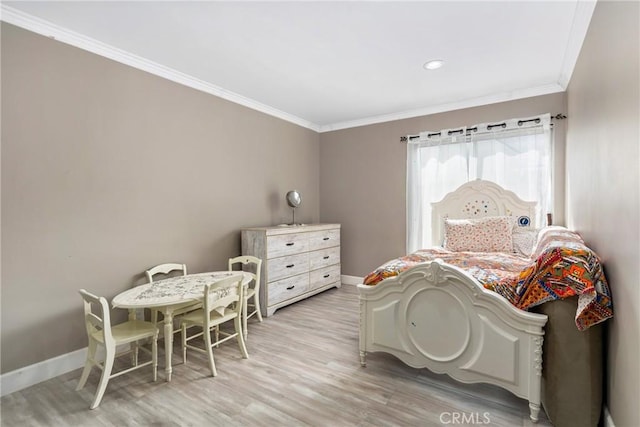 bedroom with recessed lighting, light wood-style flooring, baseboards, and ornamental molding