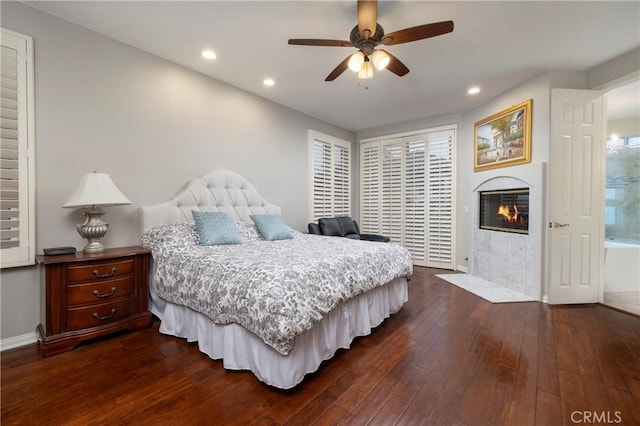 bedroom featuring dark hardwood / wood-style flooring and ceiling fan