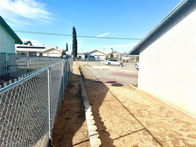 view of road with a residential view