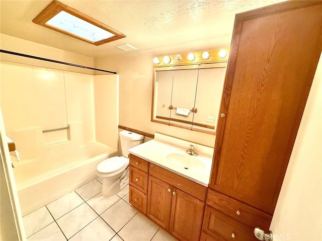 full bath with vanity, shower / bathing tub combination, a textured ceiling, tile patterned floors, and toilet