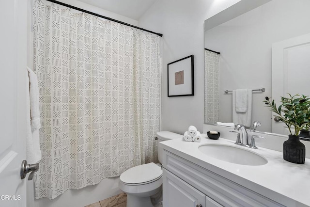 full bathroom with vanity, toilet, and shower / bath combo with shower curtain