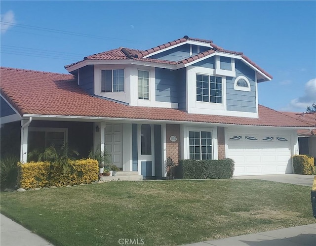 view of front facade with a front yard and a garage