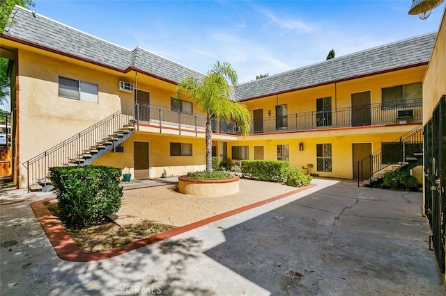 view of property's community with a patio area