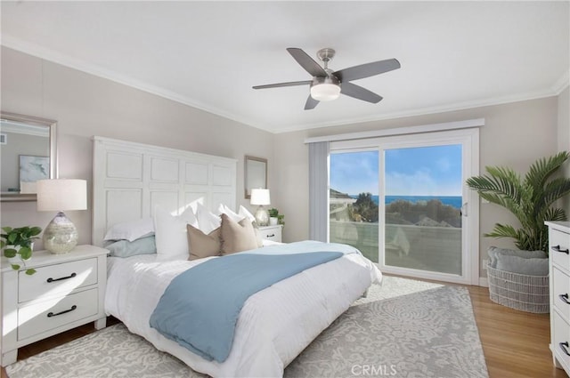 bedroom with ceiling fan, ornamental molding, access to exterior, and light hardwood / wood-style flooring