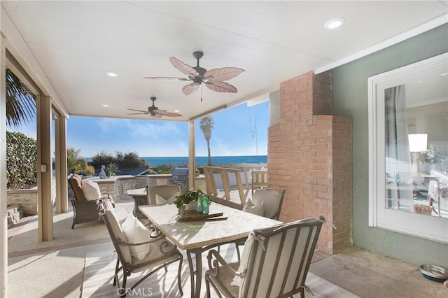 view of patio / terrace featuring ceiling fan