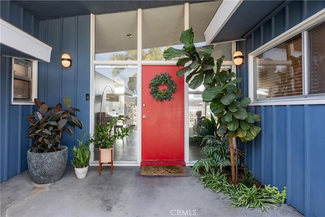 entrance to property with a patio area