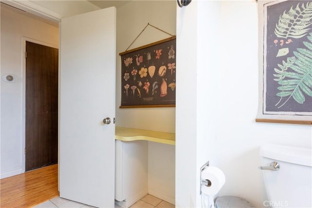 bathroom with tile patterned floors and toilet