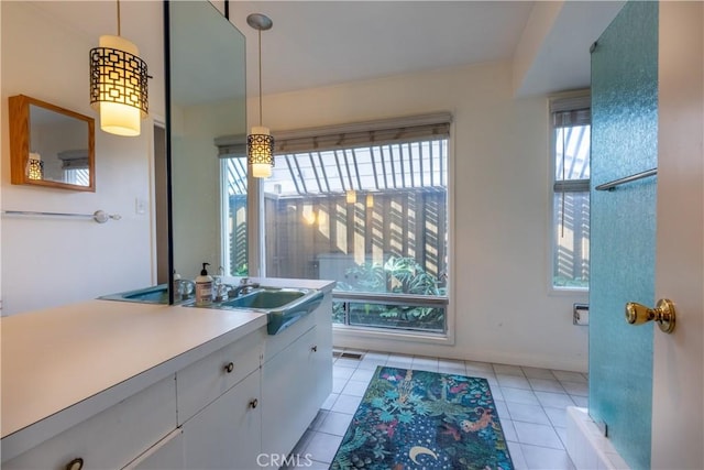 bathroom featuring vanity and tile patterned flooring