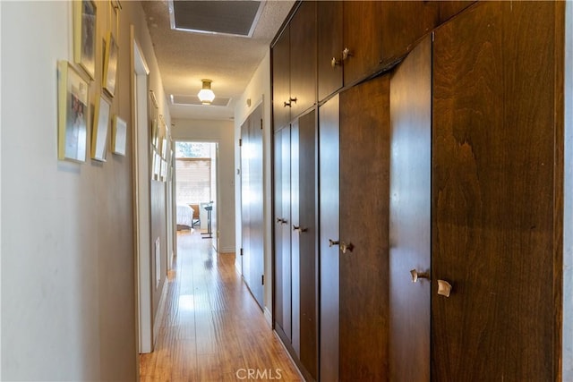 corridor featuring light wood-type flooring