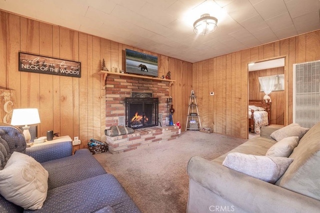 carpeted living room featuring wooden walls and a brick fireplace