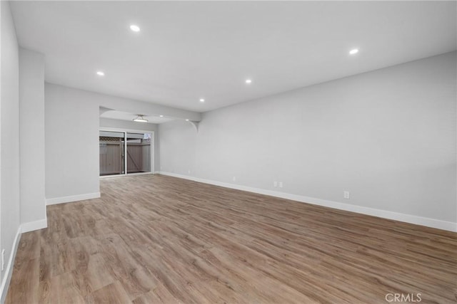 unfurnished living room featuring light wood-type flooring