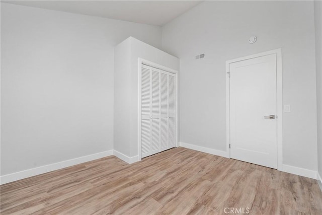 spare room featuring light hardwood / wood-style flooring