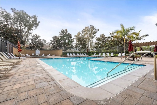 view of pool featuring a pergola and a patio