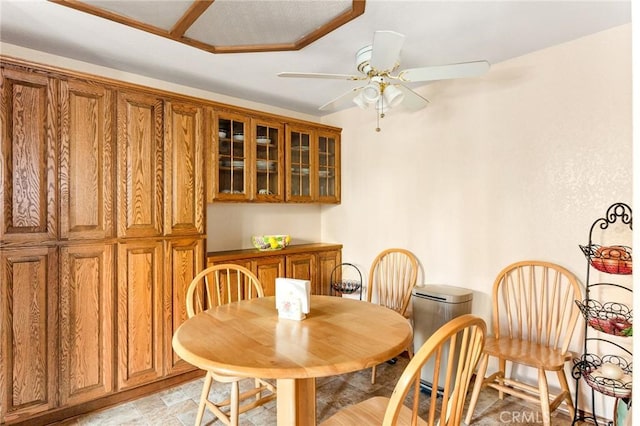 dining room with ceiling fan