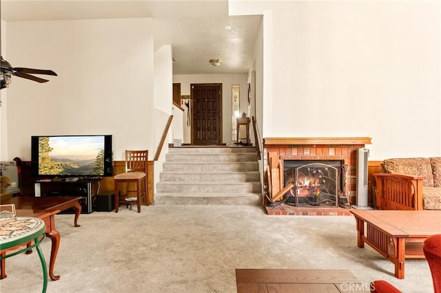 interior space featuring a fireplace and ceiling fan