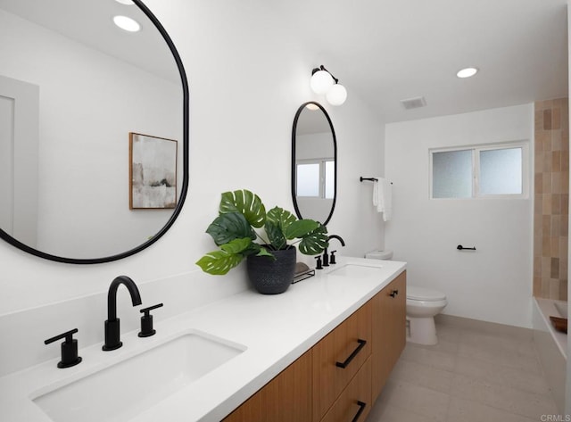 full bathroom featuring vanity, tile patterned floors, bathtub / shower combination, and toilet