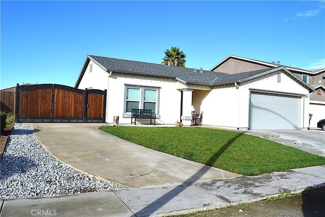 ranch-style house featuring a garage and a front lawn