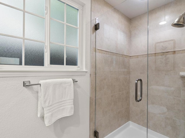 bathroom with walk in shower