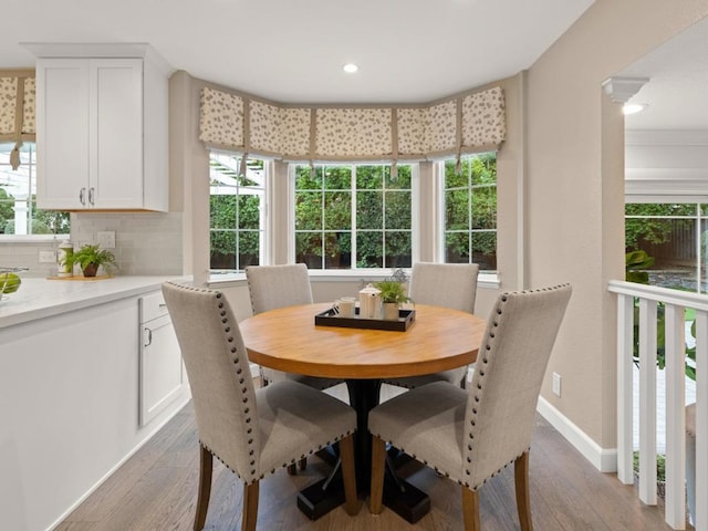 dining room with light hardwood / wood-style floors