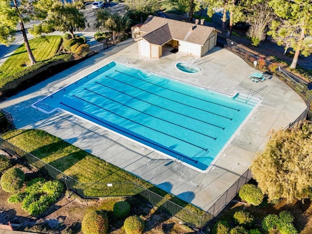 view of swimming pool featuring a patio area