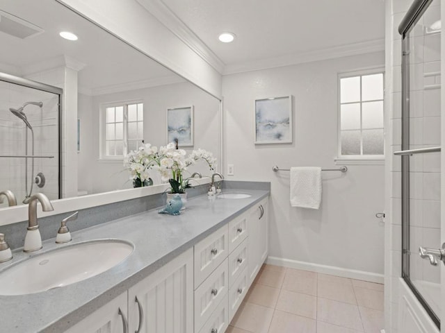 bathroom featuring crown molding, tile patterned floors, vanity, and walk in shower