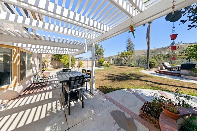 view of patio / terrace featuring a pergola