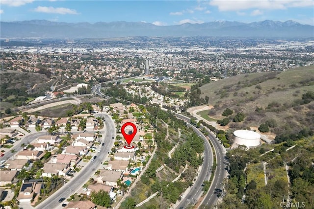 bird's eye view with a residential view and a mountain view