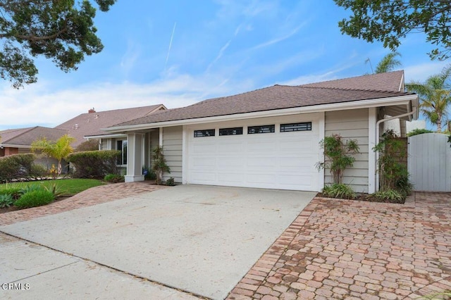 single story home with a garage