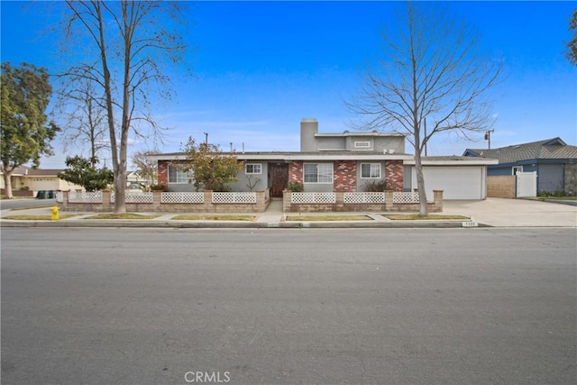 single story home with a garage