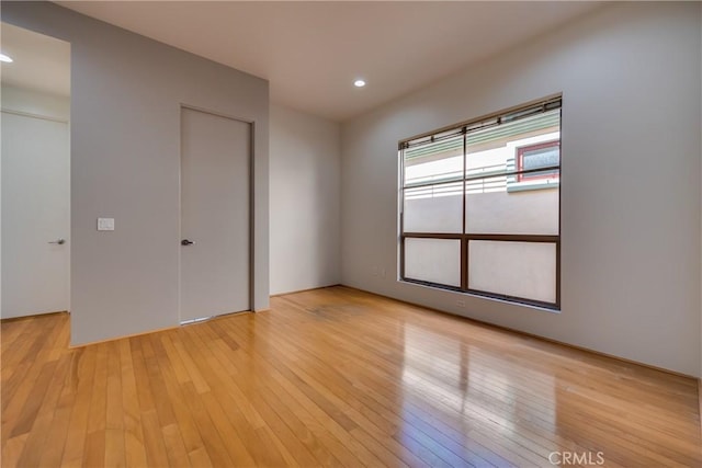 unfurnished bedroom with light hardwood / wood-style flooring