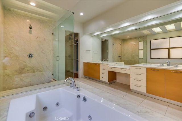 bathroom with vanity, tile patterned flooring, and independent shower and bath