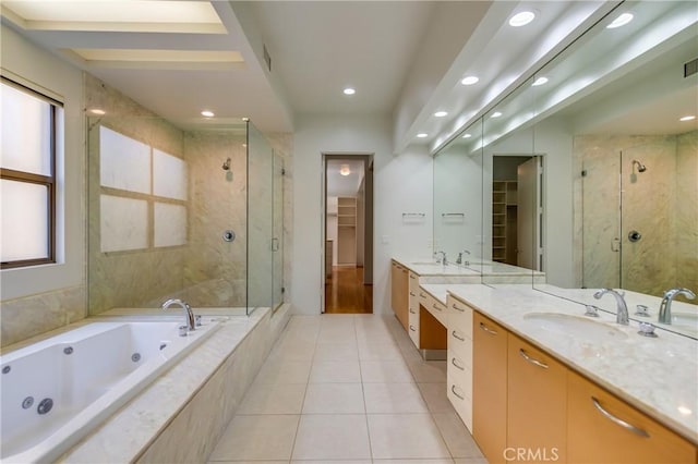 bathroom with vanity, separate shower and tub, and tile patterned floors