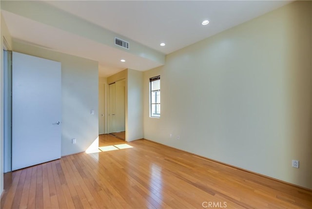 empty room featuring light hardwood / wood-style floors