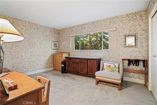 living area featuring light colored carpet