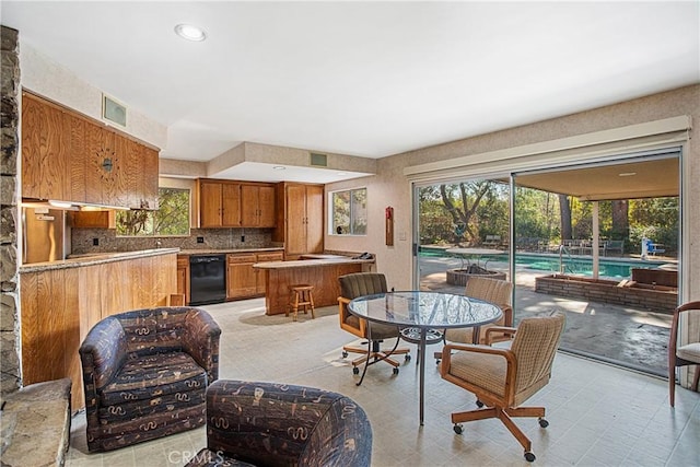 dining room with plenty of natural light